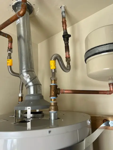 Water heater installation and plumbing repair in McNulty